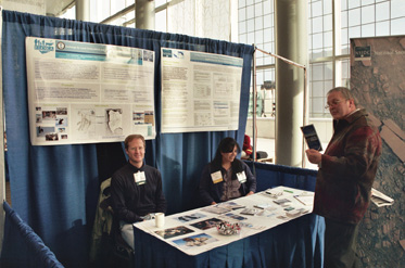 From L-R Henry Huntington and Heidi McCann at the Alaska Forum on the Environment 2011 in Anchorage, AK. Photo credit: Heidi McCann