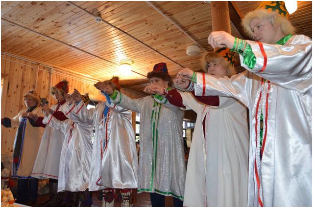 The Singer with his assistants sing Bear song "Song of the Pelym Torum." Performed by A.A. Yernikhov, Kazym, Northern Khanty. Photo courtesy Tatiana Moldanova