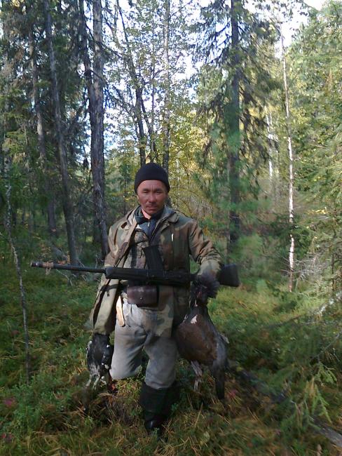 Subsistence hunting of forest game birds. Photo by N. Tasmanov, used with permission.