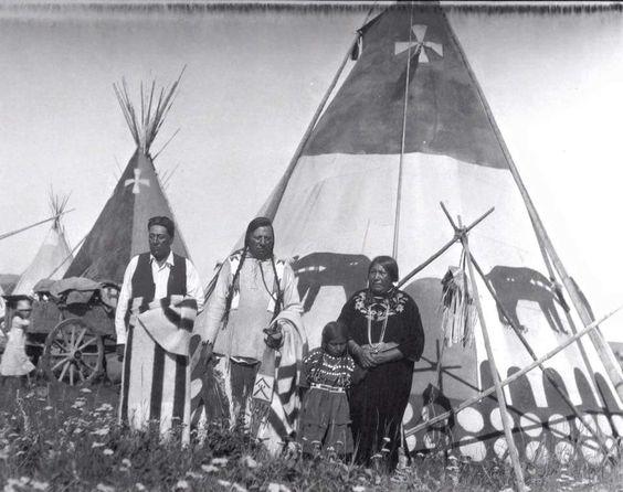 “Piikani [Blackfeet] Family in front of Tipi with Bear Design, Cardston, Alberta, 1927.” Photographer: James Willard Schultz